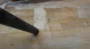 Cleaning Sawdust in a Garage